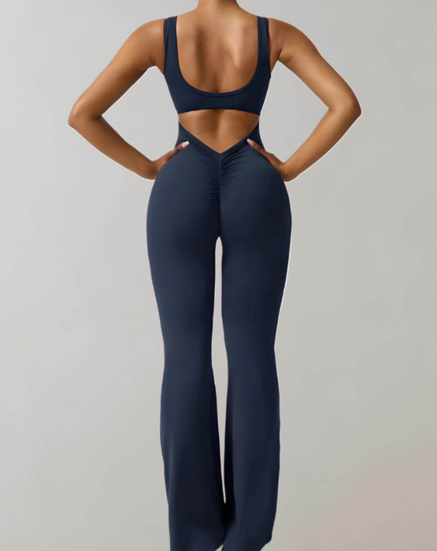 Carol - mouwloze bodycon jumpsuit met rugloze, U&V rugdetails