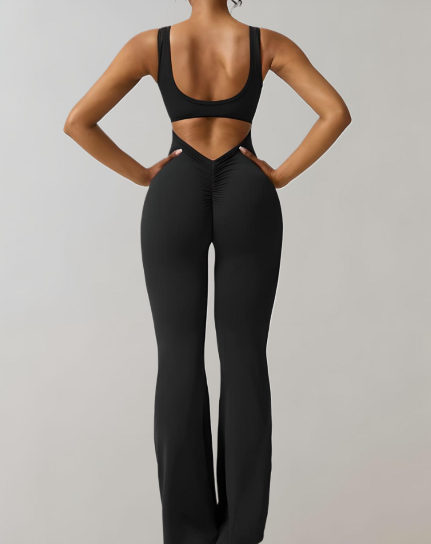 Carol - mouwloze bodycon jumpsuit met rugloze, U&V rugdetails