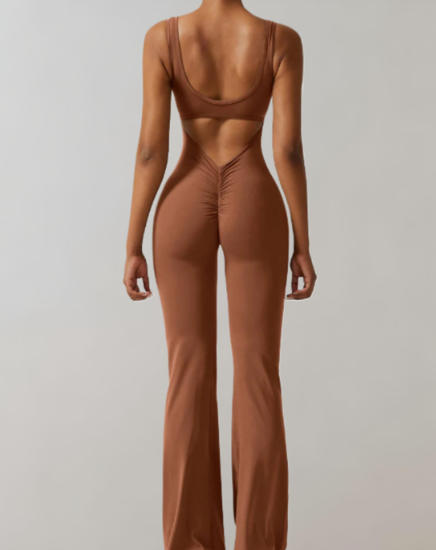 Carol - mouwloze bodycon jumpsuit met rugloze, U&V rugdetails